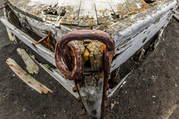 Old wrecked boat on the beach of Deception Island in Antarctica, clouse up