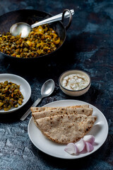 roti and bhindi fry, famous indian meal flatbread and okra fry