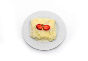 Traditional Ramadan Dessert Gullac. Turkey and made the month of Ramadan, light sweet milk. on white background