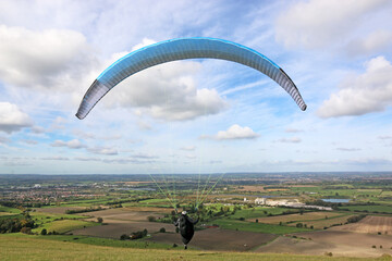 Paraglider flying wing at Milk Hill