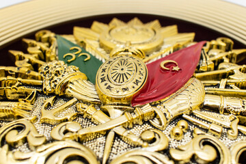 Ottoman Empire Emblem. Golden-leaf Ottoman Empire Emblem isolated on white background