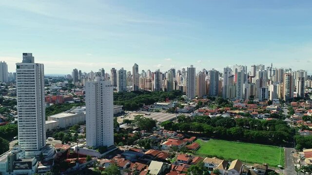 Aerial view of the city of Goi&acirc;nia, state of Goi&aacute;s, Brazil. City divided between an area full of buildings and others of residential houses. Concept of population growth increasing.
