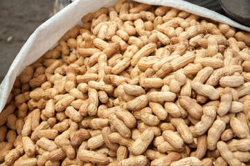 Bag full of raw peanuts selling at Bazaar in Bishkek, Kyrgyzstan