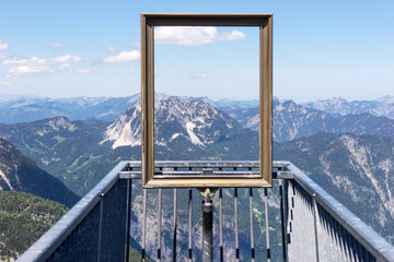 View of the mountains through the picture frame. Viewing platform Five Fingers. Dachstein-Krippenstein. Salzkammergut. Austria