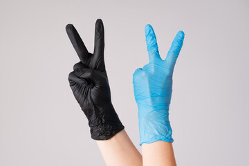 Human hand in latex gloves, outbreak of coronavirus disease 2019 or covid-19