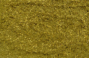 Background made of middle eastern traditional spice mixture zaatar.