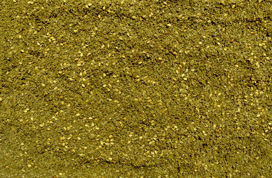 Background made of middle eastern traditional spice mixture zaatar.