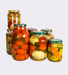 Preserved vegetables on white background. Homemade blanks.