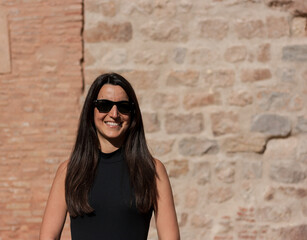 Girl with black t-shirt, sunglasses and background