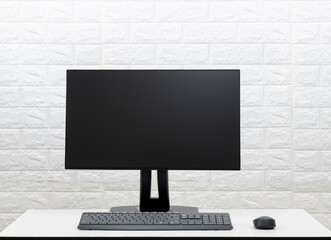 Computer, keyboard and mouse on the desk