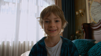 Boy having a video call at home