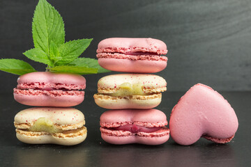 heart shaped macaroons  in pink and pale yellow with mint