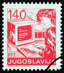 Woman working at computer (Yugoslavia 1988)