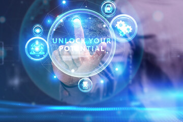Business, Technology, Internet and network concept. Young businessman working on a virtual screen of the future and sees the inscription: Unlock your potential