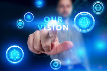 Business, Technology, Internet and network concept. Young businessman working on a virtual screen of the future and sees the inscription: Our vision