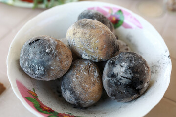 Charcoal baked potatoes
