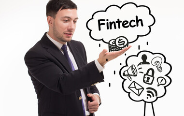 Business, technology, internet and network concept. Young businessman thinks over the steps for successful growth: Fintech