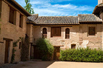 Courtyard and buildings of the Alhambra Interior of the Alhambra.