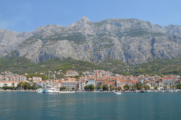Fototapeta na wymiar Panoramic view of the Croatian town of Makarska on a summer day.
