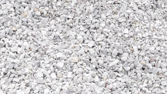 Close up gravel Many small crushed stones construction materials production factory, heavy industry concept