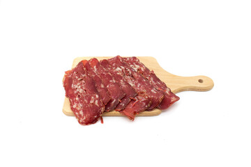 Obraz premium Turkish bacon on white background. thinly sliced ​​bacon. Turkey meat special to the city of Kayseri.