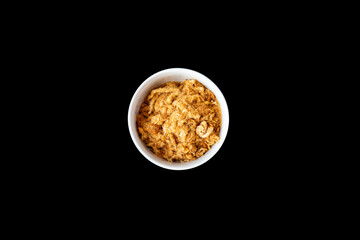 Stir fried bamboo shoots, pork and Riceberry Rice abd dried shredded pork with Cakes and coffee on a black background