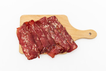 Turkish bacon on white background. thinly sliced ​​bacon. Turkey meat special to the city of Kayseri.