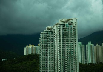 Fototapeta premium Tall buildings in Lantau island Hong Kong on a cloudy day.