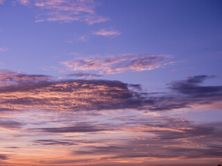 Fototapeta na wymiar Evening sky with golden clouds