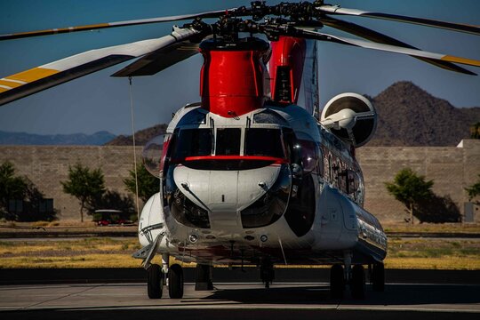 A CH-47 chinook helicopter on the ramp at Falcon field in Mesa AZ, during the busy fire season.