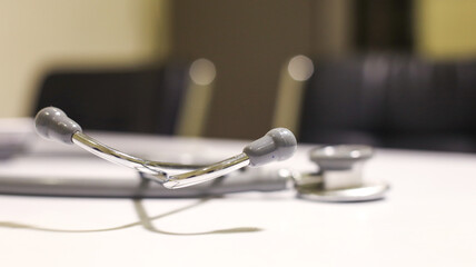 Doctor's stethoscope on the table, close up view of stethoscope