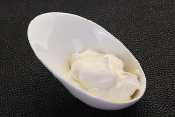Sour cream in the bowl