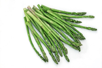 Bunch of fresh green asparagus spears isolated on white.