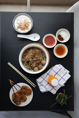 Beef noodles  and Grilled pork with Pla Krim Khai tao (Sweet Rice Noodles with Coconut Cream)