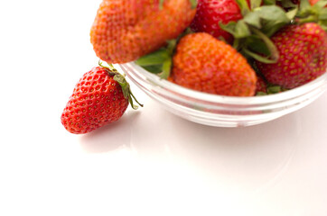 red strawberry isolated on white background in arrow 21