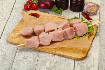 Raw pork meat skewer for grill