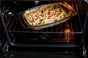 Appetizing homemade berry pie. Pie with red currants, gooseberries, black currants