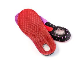 Orthopedic insoles for athletic shoes
