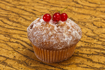 Sweet tasty muffin with red currants