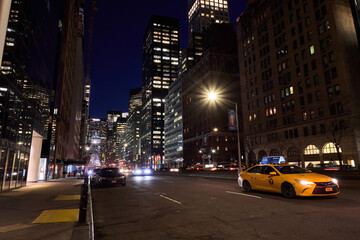Fototapeta na wymiar Street- Night- Light- Buildings- Manhattan- New York City- United States- USA.