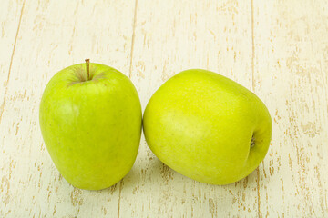 Two ripe green sweet apples