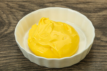 Natural cheese sauce in the bowl