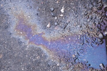Oil spills from cars cause pollution and are harmful to the environment.