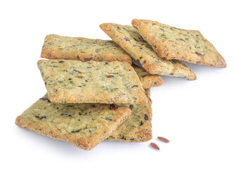 Cereal crackers isolated on white background.  Crispy breads with sesame and flax seeds,  close up