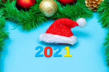 Christmas composition with fir tree branches and festive decoration,New year 2021 on white background.