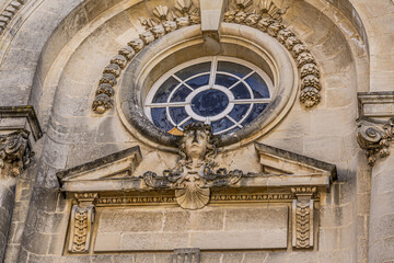 Bayonne, France. 19.06.2020. Sculpture on the museum building. Beautiful closeup for decoration design. History art. Beauty face.