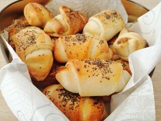 Homemade croissants in a basket close up