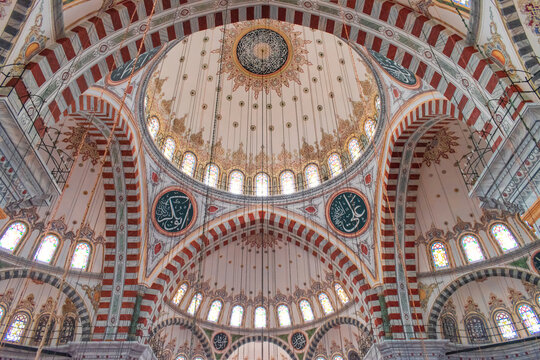 Istanbul , Turkey / July 2019 Fatih Mosque and Complex is a mosque and complex built by Fatih Sultan Mehmed in Fatih district of Istanbul. Interior architecture of the mosque, dome, columns and light