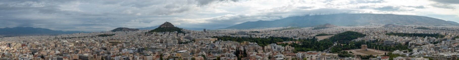Fototapeta na wymiar Panorama from the city of Athens, Greece. Bird eye drone style aerial shot.