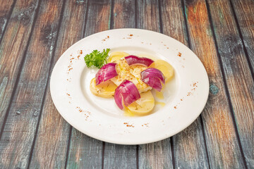 Grilled cod on white plate